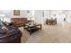 Inviting living room featuring tile flooring and comfortable seating, perfect for relaxing and entertaining guests at 1009 Fishing St, Henderson, NV 89011