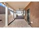 Covered patio offers a comfortable outdoor living space with brick flooring at 1009 Fishing St, Henderson, NV 89011