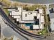 An aerial view showcasing the modern architecture, outdoor amenities, and desert landscaping at 11 Cloud Chaser Blvd, Henderson, NV 89012
