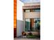 Modern home exterior featuring artistic design elements, unique landscaping, and clean architectural lines at 11 Cloud Chaser Blvd, Henderson, NV 89012