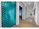 Spacious hallway features decorative wall art and recessed lighting at 11 Cloud Chaser Blvd, Henderson, NV 89012