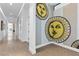 Hallway featuring unique sunburst mosaic art and stylish terrazzo flooring at 11 Cloud Chaser Blvd, Henderson, NV 89012