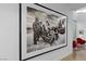 Hallway featuring bold modern art with a view to a sitting area at 11 Cloud Chaser Blvd, Henderson, NV 89012