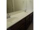 Bathroom with a long vanity with double sinks and plenty of cabinet space at 11489 Belmont Lake Dr # 106, Las Vegas, NV 89135