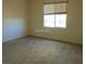 Standard bedroom featuring a single window that allows natural light to flow into the room at 11489 Belmont Lake Dr # 106, Las Vegas, NV 89135