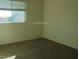 Bright bedroom featuring a window to provide a view of the outdoors at 11489 Belmont Lake Dr # 106, Las Vegas, NV 89135
