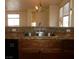 Close up of the sink and countertop showing the stainless fixtures and granite counter at 11489 Belmont Lake Dr # 106, Las Vegas, NV 89135