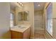 Stylish bathroom with a vanity, large mirror, and a tub-shower combo, perfect for relaxation at 12045 Yarrow Ridge Ct, Las Vegas, NV 89183
