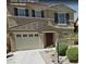 Charming two-story home with a two-car garage and well-maintained landscaping at 12045 Yarrow Ridge Ct, Las Vegas, NV 89183
