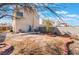 Expansive backyard perfect for entertaining and relaxation, with trees and privacy fence at 1312 Pacific Terrace Dr, Las Vegas, NV 89128