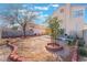 Large backyard featuring mature trees and room for relaxation and entertaining at 1312 Pacific Terrace Dr, Las Vegas, NV 89128