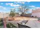 Spacious backyard featuring mature trees and plenty of room for outdoor enjoyment at 1312 Pacific Terrace Dr, Las Vegas, NV 89128