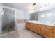 Bathroom with a walk-in shower and a tub at 1312 Pacific Terrace Dr, Las Vegas, NV 89128