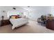 Bright bedroom featuring a comfortable bed and desk area at 1312 Pacific Terrace Dr, Las Vegas, NV 89128