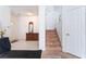 Entryway with tiled floors, decorative dresser, stairs, and a welcoming ambiance at 1312 Pacific Terrace Dr, Las Vegas, NV 89128