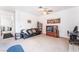 Spacious living room with a comfortable sofa, entertainment center, and plenty of natural light at 1312 Pacific Terrace Dr, Las Vegas, NV 89128