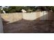 Spacious backyard featuring a cinder block wall for privacy and a lot of open space at 2021 San Simeon St, Las Vegas, NV 89108