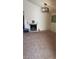 Spacious living room featuring a fireplace, a large window for natural light, and neutral carpet at 2021 San Simeon St, Las Vegas, NV 89108