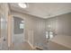 Upstairs hallway featuring neutral colors and modern lighting at 2061 Smoketree Village Cir, Henderson, NV 89012