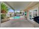 Backyard patio featuring a private pool with a covered patio at 2061 Smoketree Village Cir, Henderson, NV 89012