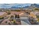 Charming single-story home boasts a terra cotta tile roof and low-maintenance desert landscaping against a mountain backdrop at 2345 Hot Brook Point St, Las Vegas, NV 89134