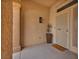 Inviting front porch with decorative security screen door, light fixture, and potted plant at 2345 Hot Brook Point St, Las Vegas, NV 89134