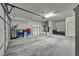 Two car garage with auto opener; storage cabinets and utility connections available at 2345 Hot Brook Point St, Las Vegas, NV 89134