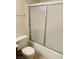 Bathroom with a toilet and shower with a sliding glass door at 2724 Otter Creek Ct # 101, Las Vegas, NV 89117