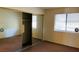 Bedroom with closet with sliding mirror doors and natural light at 2724 Otter Creek Ct # 101, Las Vegas, NV 89117