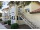 Apartment building featuring outdoor stairways leading to upper-level units at 2724 Otter Creek Ct # 101, Las Vegas, NV 89117