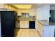Traditional kitchen features granite countertops, and white cabinets at 2724 Otter Creek Ct # 101, Las Vegas, NV 89117