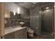 Modern bathroom with intricate tile work, floating vanity, and glass-enclosed shower at 2777 Paradise Rd # Ph 3001, Las Vegas, NV 89109