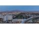 Expansive city view overlooking lush greenery, a golf course, and city buildings at 2777 Paradise Rd # Ph 3001, Las Vegas, NV 89109