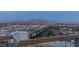 A stunning panoramic city view, stretching from lush green spaces to distant mountain peaks at dusk at 2777 Paradise Rd # Ph 3001, Las Vegas, NV 89109
