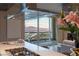 Bright open-concept living area featuring an incredible view of the city, a kitchen, and a fireplace at 2777 Paradise Rd # Ph 3001, Las Vegas, NV 89109