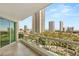 Balcony view featuring city buildings with a tree-lined street at 2857 Paradise Rd # 601, Las Vegas, NV 89109