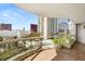 Spacious balcony features a beautiful view of the city skyline and landscaping at 2857 Paradise Rd # 601, Las Vegas, NV 89109