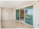 Tiled balcony with sliding glass doors offering views of the city and reflecting the interior living space at 2857 Paradise Rd # 601, Las Vegas, NV 89109