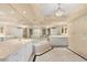 Bright bathroom features a soaking tub, double sinks, and a chandelier at 2857 Paradise Rd # 601, Las Vegas, NV 89109