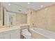 Bathroom showcasing a combined shower and bathtub with beige tile and vanity sink at 2857 Paradise Rd # 601, Las Vegas, NV 89109