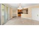 Elegant living room with marble floors, access to kitchen, and beautiful chandelier at 2857 Paradise Rd # 601, Las Vegas, NV 89109