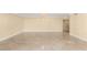 Large, open living room showing neutral walls and tile flooring with chandelier lighting at 2857 Paradise Rd # 601, Las Vegas, NV 89109