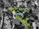 Overhead view of an estate featuring mature landscaping, pool, circular driveway and a private outdoor space at 3001 Astoria Pines Cir, Las Vegas, NV 89107