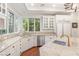Bright and airy kitchen with stainless steel appliances, granite countertops, and ample cabinet space at 3001 Astoria Pines Cir, Las Vegas, NV 89107