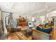 Bright living room boasting hardwood floors, stylish furnishings, and lots of natural light at 3001 Astoria Pines Cir, Las Vegas, NV 89107