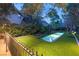 Stylish pool with manicured lawn and patio area for relaxation and entertainment at 3001 Astoria Pines Cir, Las Vegas, NV 89107