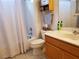 Bright bathroom featuring a shower-tub combo and a vanity with storage at 3455 Erva St # 219, Las Vegas, NV 89117