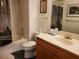 Bathroom featuring a shower-tub combo, a vanity with storage, and a framed art print at 3455 Erva St # 219, Las Vegas, NV 89117