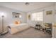 Comfortable bedroom features a bed, desk, and window, creating a cozy and functional living space at 3455 Erva St # 219, Las Vegas, NV 89117