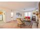 Comfortable living room featuring a fireplace, bright natural light, and neutral decor at 3455 Erva St # 219, Las Vegas, NV 89117